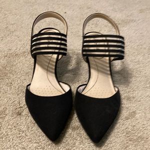 Black dress shoes with 1.5 inch heel.